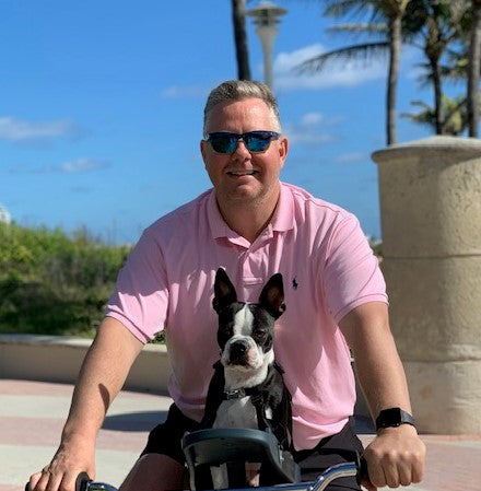 cute puppy riding bike